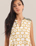 Sleeveless long dress with asymmetric hemline